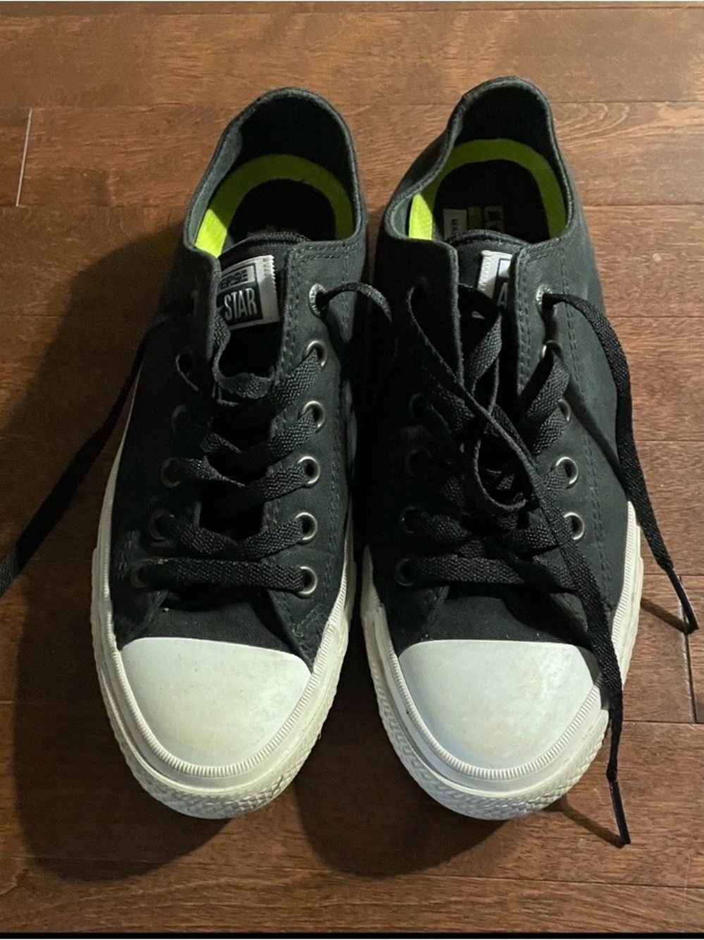 Converse Low Top Sneakers in Black with White Toe